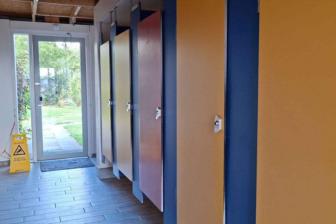 Modern toilets in the sanitary building of De Brongaard